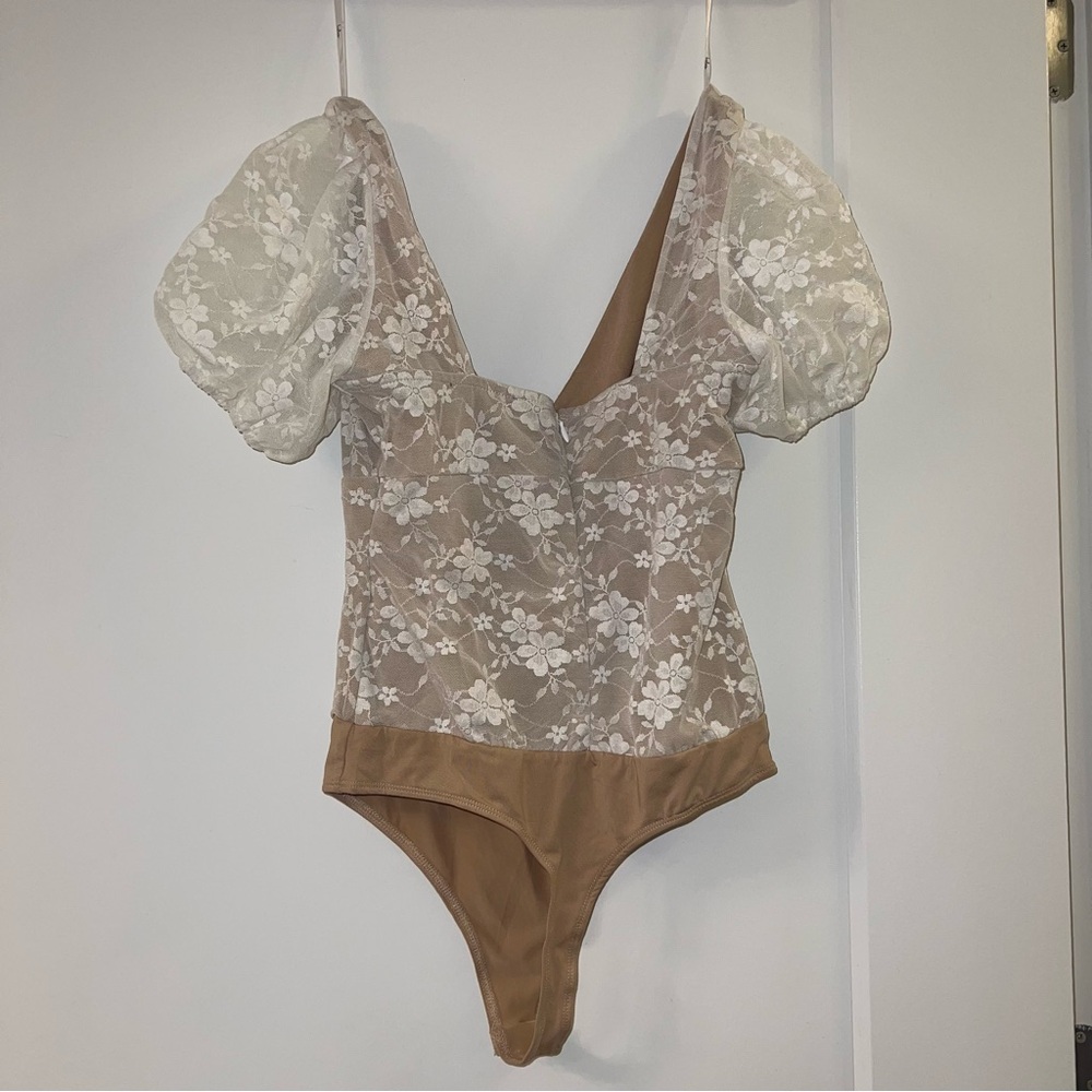 So Sunny Ivory Lace Cutout Short Sleeve
Bodysuit - Picture 10 of 12